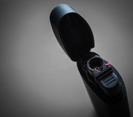 Close up of a black object on a grey background, studio shotの写真素材