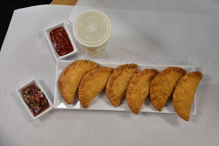 An Overhead Photograph of Freshly Cooked Empanadas