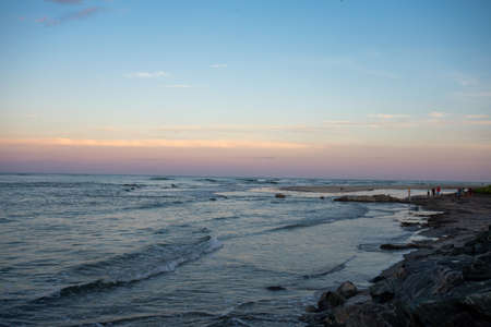 A Beautiful View of the Ocean and Sky at the North Wildwood Sea Wall in New Jerseyの写真素材