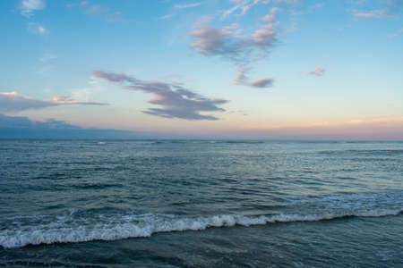 A Beautiful View of the Ocean and Sky at the North Wildwood Sea Wall in New Jerseyの写真素材
