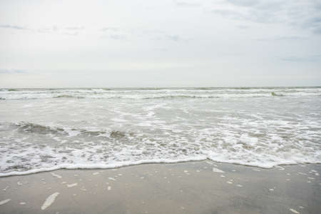 A View of the Horizon Over the Ocean on the Beach on an Overcast Skyの写真素材