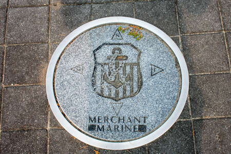 WILDWOOD, NEW JERSEY - September 16, 2020: A Circular Symbol Representing The US Merchant Marines on the Ground.のeditorial素材