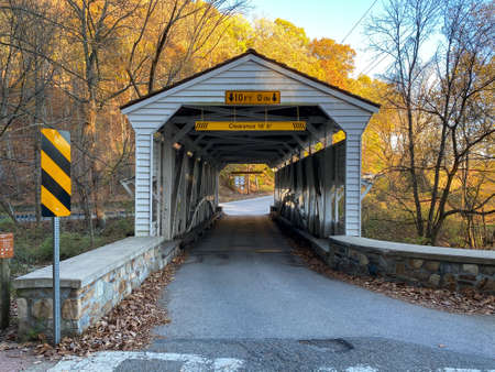 The Knox Covered Bridge on a Clear Autumn Day at Sunset at Valley Forge National Parkの写真素材