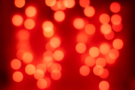 Bright Orange Bokeh On a Black Backgroundの写真素材