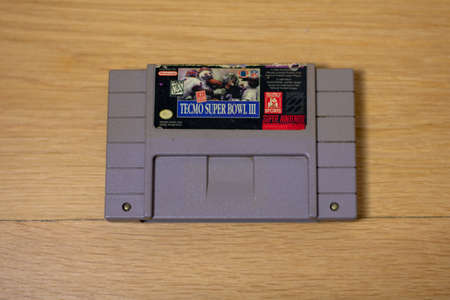 Tecmo Super Bowl 3 For the Super Nintendo Entertainment System, a Popular Retro Video Gameのeditorial素材