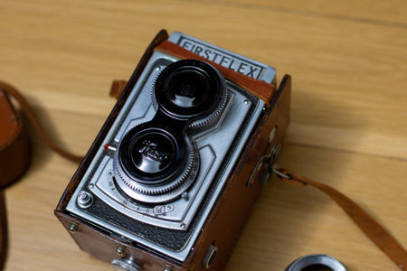December 6, 2020 - Elkins Park, PA: A Vintage 1950s Firstflex Camera With Color Filters Next to Itのeditorial素材