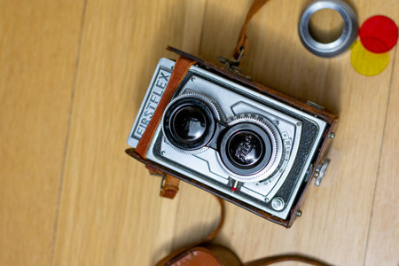 December 6, 2020 - Elkins Park, PA: A Vintage 1950s Firstflex Camera With Color Filters Next to Itのeditorial素材