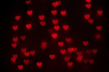 Orange Heart Shaped Bokeh on Blackの写真素材