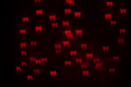 Orange Bow Shaped Bokeh on Blackの写真素材
