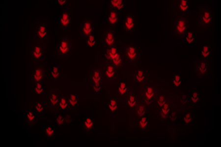 Orange Flower Shaped Bokeh on Blackの写真素材