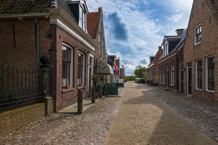 Street leading to the sea in Hindeloopen in Holland.の写真素材