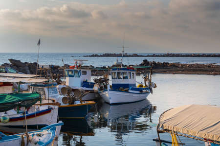 Sunrise at the beach In Monolithos on the island of Santorini in Greece.の写真素材