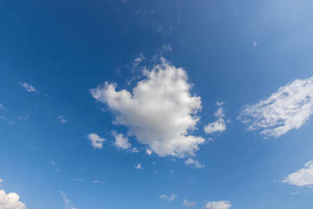 Blue sky with white clouds in sunny weather.