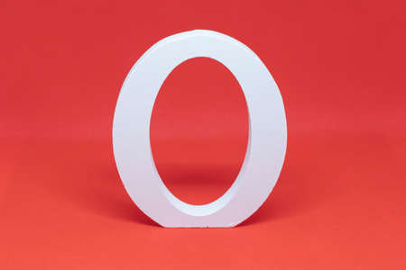 Letter O in white on a red background for composing the word loveの写真素材