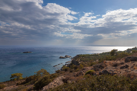 Beautiful seascape. Coast of the island of Crete - Greece area of Lerapetra Eden Rock. There are dramatic clouds in the sky.の写真素材