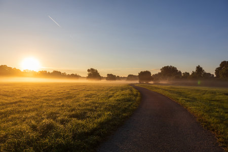 Beautiful autumn landscape at sunrise. Clearing fog. Pagansko Czech Republic Europeの写真素材