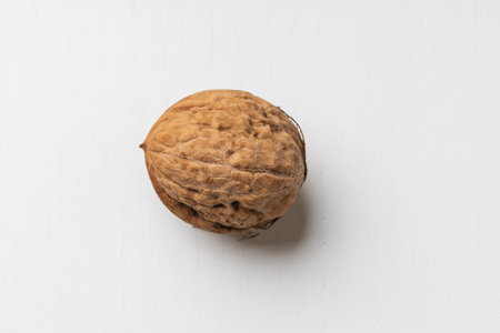 Walnuts on a white table. Pure white background.の写真素材
