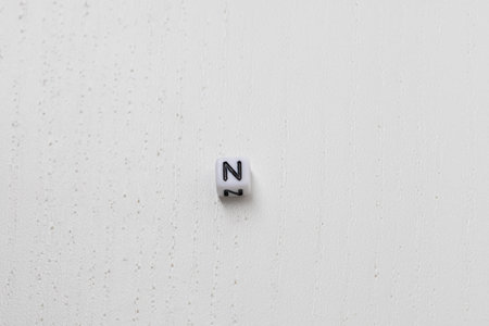 Small white cubes with the letters of the alphabet on them.の写真素材