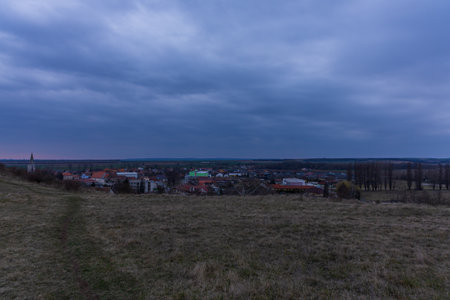 Hosteradice, Czech Republic, March, 22, 2025 - Evening landscape. View of the village at duskの写真素材