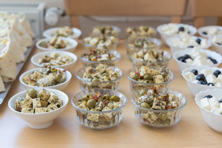 Refreshments on tables in the form of a banquet