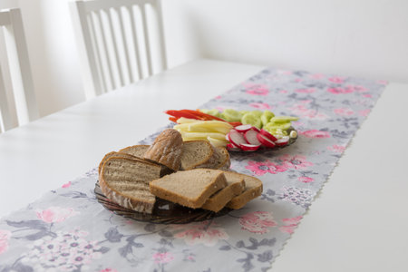 Sliced ââbread on a plate is on the breakfast tableの写真素材