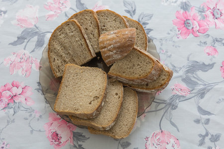 Sliced ââbread on a plate is on the breakfast tableの写真素材