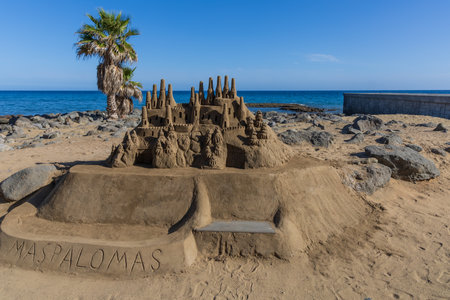 Faro de Maspalomas Spain seascape, beach and lighthouse Faro and sand dunes in Gran Canariaの写真素材