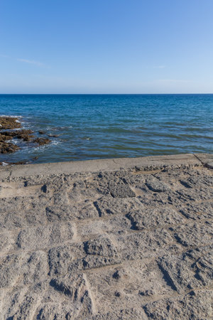 Faro de Maspalomas Spain seascape, beach and lighthouse Faro and sand dunes in Gran Canariaの写真素材