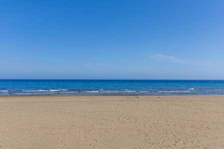 Faro de Maspalomas Spain seascape, beach and lighthouse Faro and sand dunes in Gran Canariaの写真素材