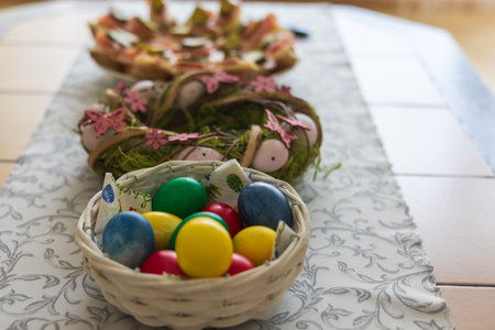 Easter decoration on the table. Candies wrapped on the table for Easterの写真素材