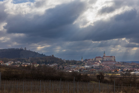Mikulov in the South Moravian Region, Czech Republic, with a view of Holy Hill (Svaty kopecek) and the chateauの写真素材