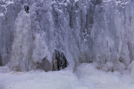 Spectacular ice formations and massive icicles on the CvrÄovice dam on the Jihlava River. The...