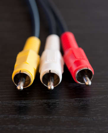 Close up of red, white and yellow RCA cablesの写真素材