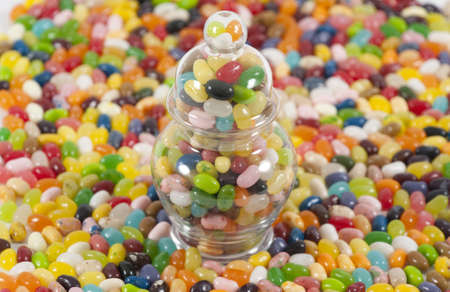 Jellybeans around a jar full of jellybeans