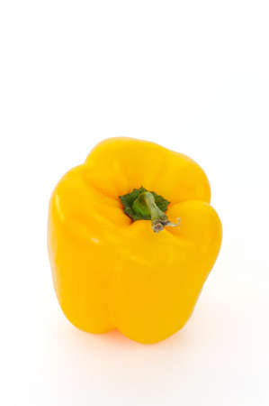 A yellow bell pepper on a white backgroundの写真素材