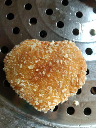 Thai sweetmeat, deep-fried dough stick on stainless steel plateの写真素材