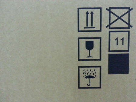 Fragile symbol on cardboardの素材