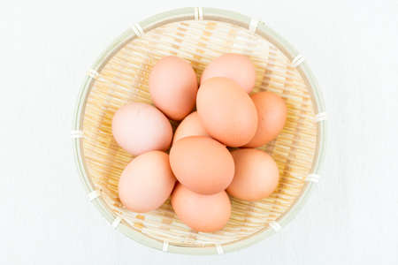 egg on bamboo basketの写真素材