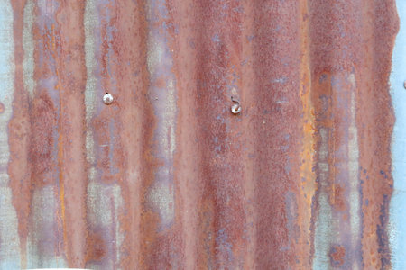 Artistic of old and rusty zinc sheet wall