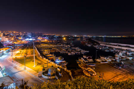 Colorful fishing boats at the night in the port of ain benian , El Djamilaの写真素材