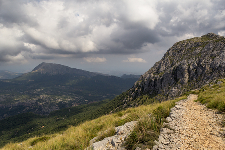 Mountain path in Serra de Tramuntana mountain range on Mallorca, Balearic Islands, Spain. Hiking trail on Majorca islandの写真素材