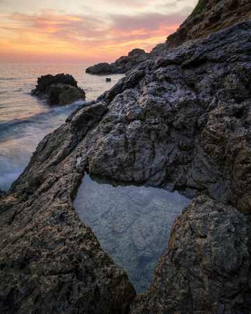 Coll Baix beach near Alcudia, Mallorca, Spain during pink pastel sunrise. Calm remote beach on Majorca, Balearic Islands.の写真素材