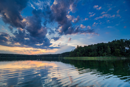 wide panorama of a beautiful, calm and wild lake in Polandの写真素材