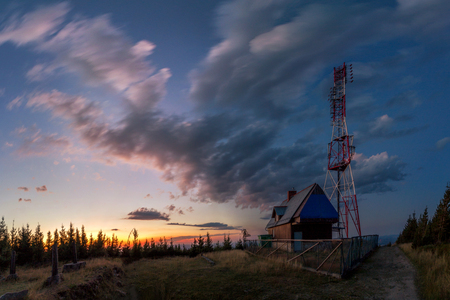 Panorama at sunset, with a building and a huge antennaのeditorial素材