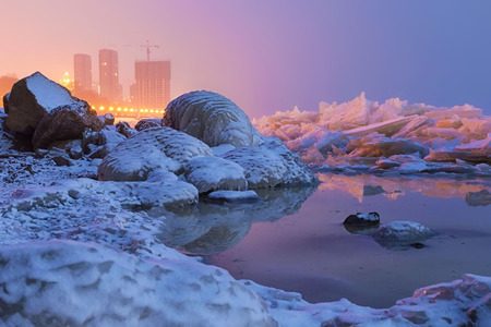 Ice drift on the Amur river. Khabarovsk embankment, far East, Russia.の写真素材