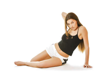 Isolated portrait of pretty young woman in sportswearの写真素材