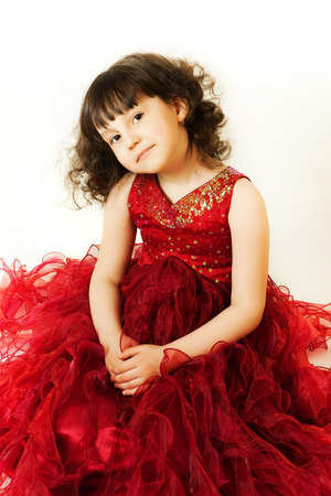 Pretty young girl portrait over grey background.の写真素材