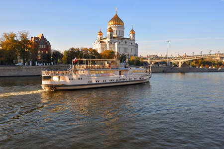 Pleasure boat passes near the Temple of Christ the Savior. MOSCOW, RUSSIAのeditorial素材