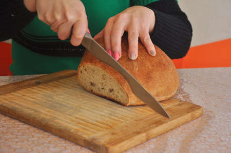 Slicing homemade breadの写真素材