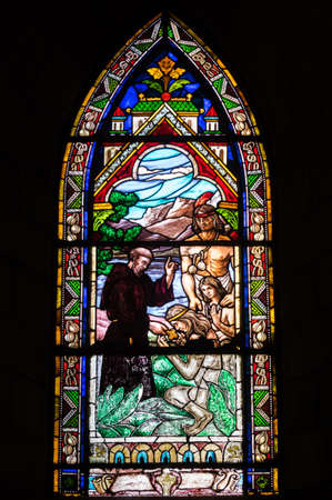 BARILOCHE, ARGENTINA - MARCH 10, 2014 - Stained glass window inside catholic church, Nahuel Huapi Cathedralのeditorial素材